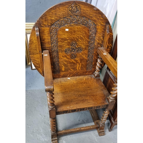 553 - Early 20th century carved oak Monk's bench/armchair, on barley twist supports.  (B.P. 21% + VAT)