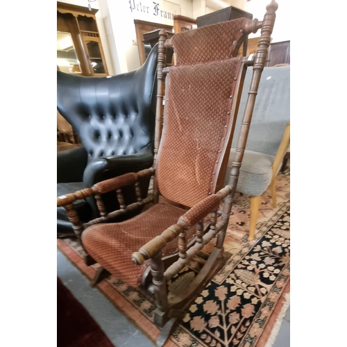 557 - 20th century American rocking armchair.  (B.P. 21% + VAT)