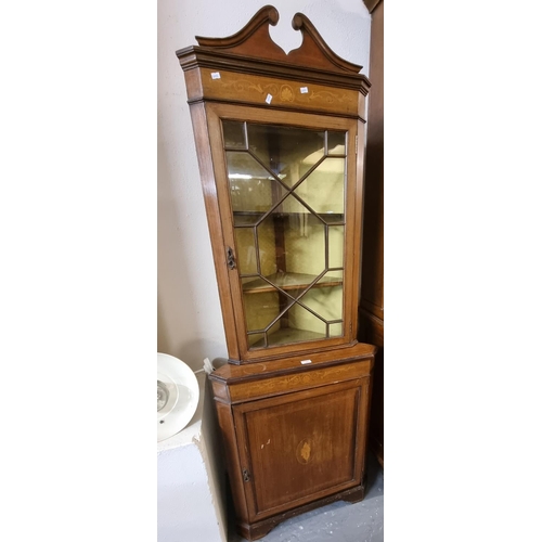 562 - Edwardian inlaid mahogany two stage astragal glazed free standing corner cabinet.  (B.P. 21% + VAT)