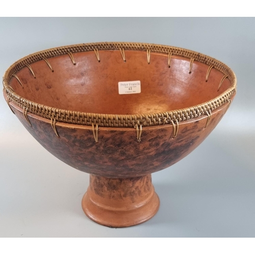 61 - Terracotta stemmed bowl with a basket weave to the rim, probably African origin.  30.5cm wide, 23cm ... 