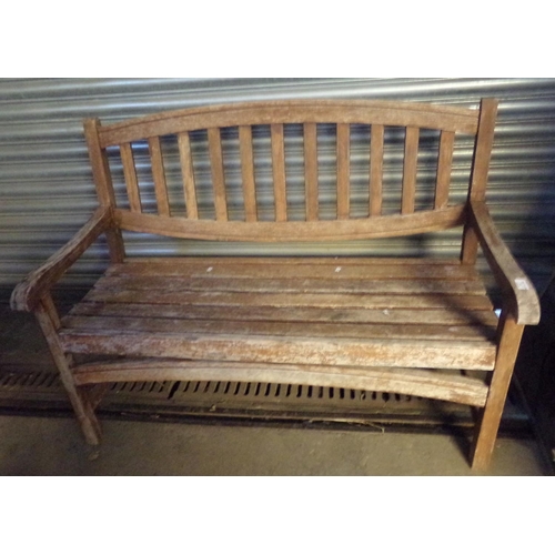 611 - Teak slat backed garden bench.  (B.P. 21% + VAT)