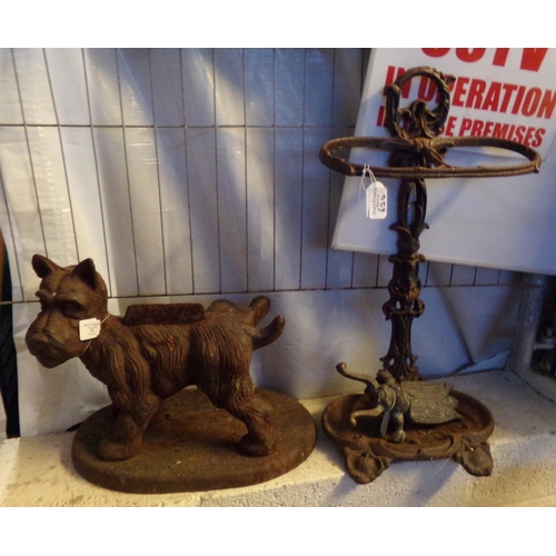 624 - Cast iron Scotty dog boot scraper together with a cast iron stick stand and beetle shaped boot jack.... 