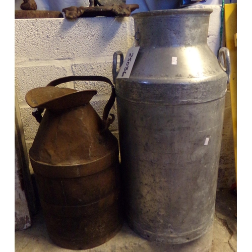 625 - A vintage steel garage can with swing handle together with an aluminium milk churn.  (2) (B.P. 21% +... 