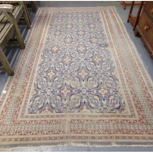 641 - Middle Eastern design blue ground carpet having central stylised floral and foliate panels with flow... 