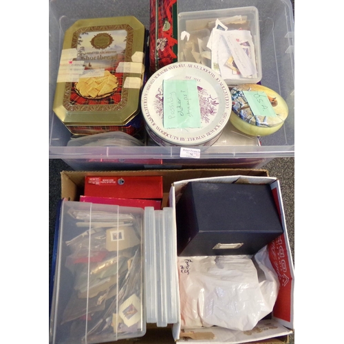 76 - Two large boxes of on and off paper all World stamps in various plastic boxes, tins and loose.  1000... 