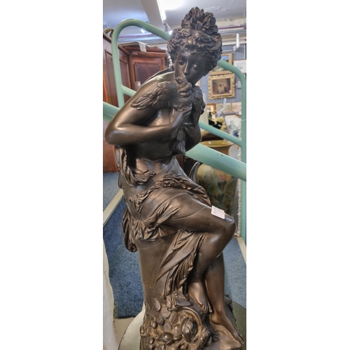 81 - After Carrier Belleuse, a bronzed plaster model of a classical female clutching two birds, on natura... 