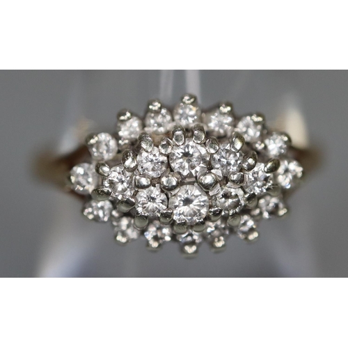 244 - 9ct gold boat shaped diamond cluster ring. 4 grams approx. 
Ring size N.
(B.P. 21% + VAT)