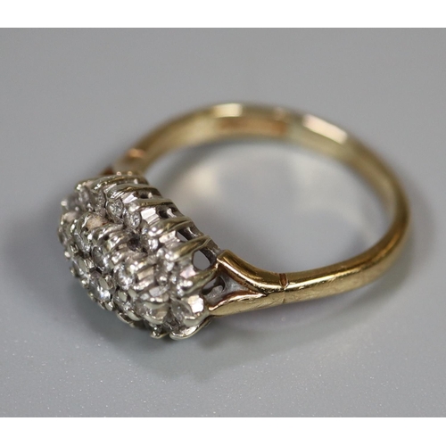 244 - 9ct gold boat shaped diamond cluster ring. 4 grams approx. 
Ring size N.
(B.P. 21% + VAT)