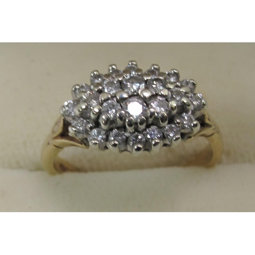 244 - 9ct gold boat shaped diamond cluster ring. 4 grams approx. 
Ring size N.
(B.P. 21% + VAT)