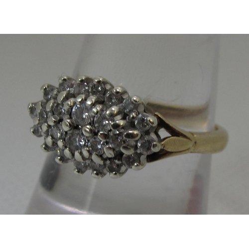 244 - 9ct gold boat shaped diamond cluster ring. 4 grams approx. 
Ring size N.
(B.P. 21% + VAT)