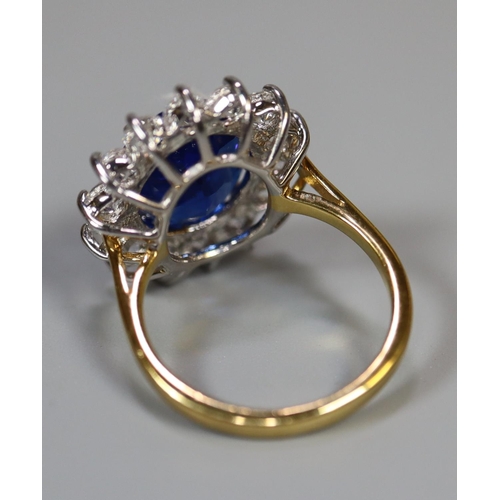 258 - A synthetic sapphire and moissanite ring set in gold plated silver. 
(B.P. 21% + VAT)