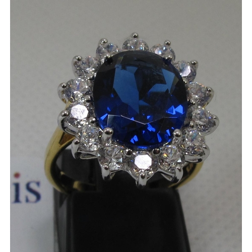 258 - A synthetic sapphire and moissanite ring set in gold plated silver. 
(B.P. 21% + VAT)