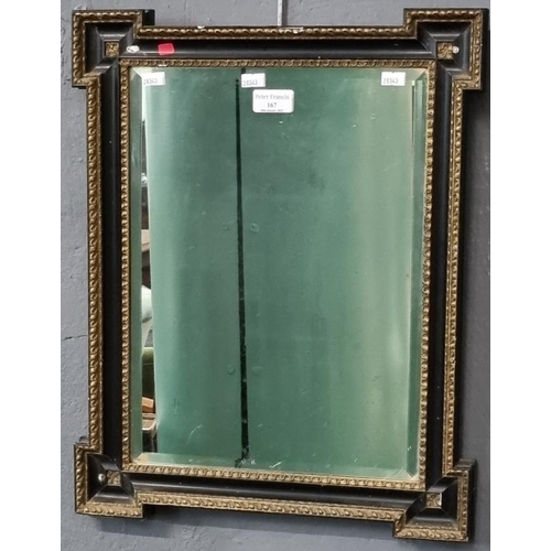 167 - Aesthetic design gilt and ebonised bevel plate wall mirror with projecting angles.  Overall 49x40cm ... 