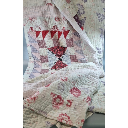 177 - Vintage cotton patchwork quilt with various fabrics, floral print to reverse. 
(B.P. 21% + VAT)