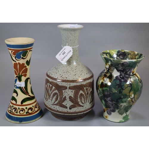 201 - Gwili Pottery 'Grape and Vine' vase, together with an Art Pottery mallet shaped 'Rye' vase and a 'Al... 