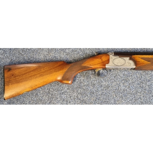 201A - Italian Acier Cockerill Zanoletti 12 bore over and under double barreled ejector shotgun having 28 i... 