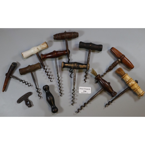 216 - Collection of antique and vintage corkscrews, various, with turned wooded and bone handles.  (B.P. 2... 