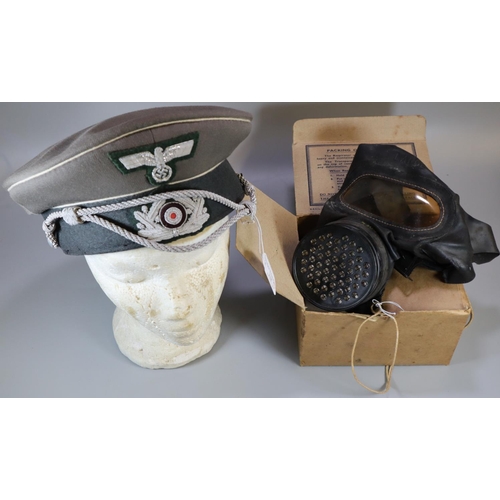 218 - German WWII style officer's cap (lacking peak) together with a boxed respirator gas mask with local ... 