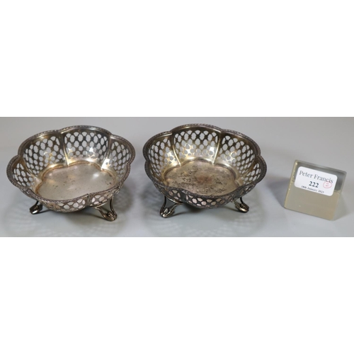 222 - Pair of silver bonbon dishes with pierced decoration standing on three stylised feet.  Chester hallm... 