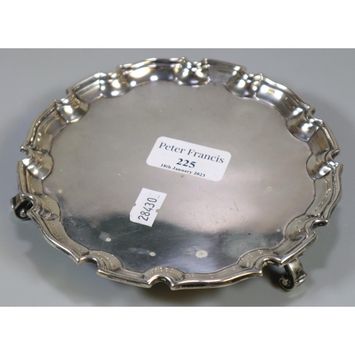 225 - Small silver pie-crust salver on three scroll feet.  Makers marks 'B&S', Sheffield hallmarks.  15cm ... 