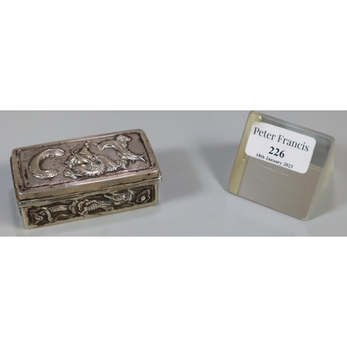 226 - Chinese export silver snuff box having repoussé dragon decoration marked to the base 'H M 06'.  8x4x... 