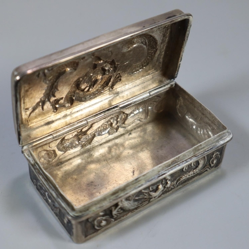 226 - Chinese export silver snuff box having repoussé dragon decoration marked to the base 'H M 06'.  8x4x... 