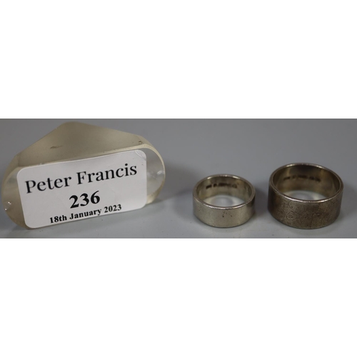 236 - Two 9ct gold wedding rings.  Ring size T and L.  Approx weight 16.6 grams.
(B.P. 21% + VAT)