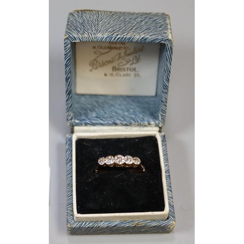 241 - 18ct gold five stone diamond ring.  Ring size L & 1/2.  Approx weight 1.7 grams.
(B.P. 21% + VAT)