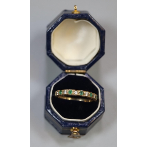 247 - A 9ct gold half eternity style ring set with green and white stones.  Ring size N.  Approx weight 1.... 