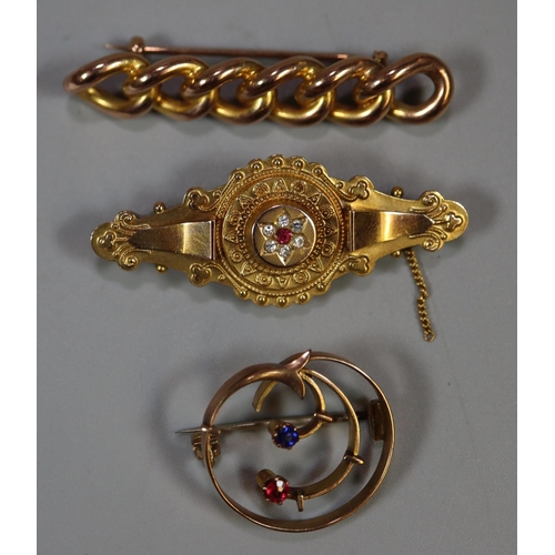 254 - Three 9ct gold brooches.  Approx weight 11.1 grams.
(B.P. 21% + VAT)