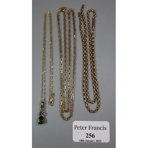 256 - Three 9ct gold chains, one with pendant, one broken.  Approx weight 18.1 grams.
(B.P. 21% + VAT)