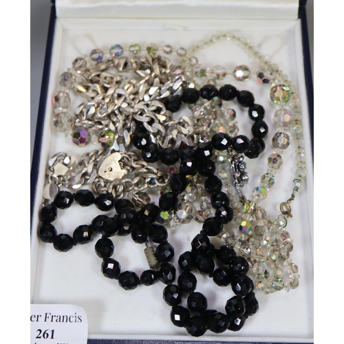 261 - A heavy silver necklace, two silver bracelets and costume jewellery.
(B.P. 21% + VAT)