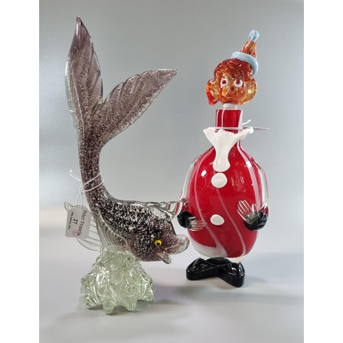 27 - Murano style glass fish on naturalistic base together with a Murano style glass clown.  (2)  (B.P. 2... 