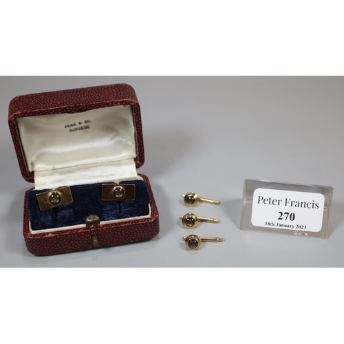 270 - A cased set of 14ct gold cufflinks with three matching studs.  Stamped, 'Alex' and 14K.  In 'Alex & ... 