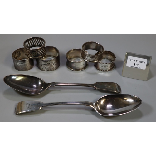 312 - Two plated fiddle pattern basting spoons and a group of six napkin rings, five being hallmarked silv... 