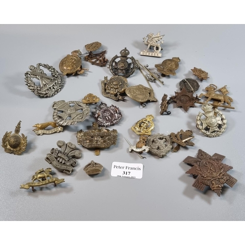 317 - Collection of various British Army cap badges, including: Gloucestershire Regiment, Lancashire Hussa... 