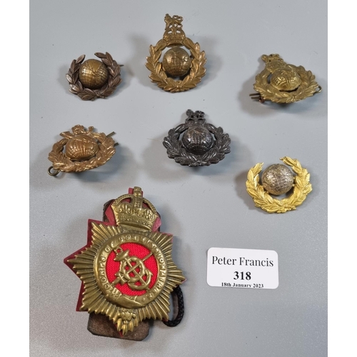 318 - Small collection of British Royal Marines cap badges, various.(B.P. 21% + VAT)