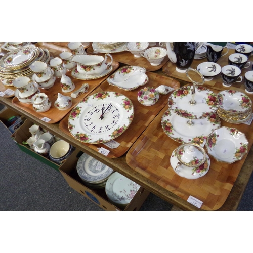 330 - Five trays of Royal Albert 'Old Country Roses' china: two wall clocks, five milk jugs, two sugar bow... 