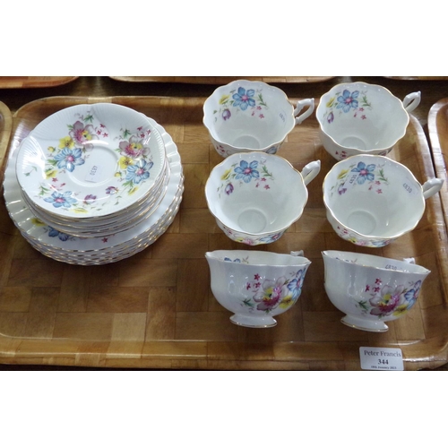 344 - Six Richmond florally decorated teacups and saucers with six teaplates.  (B.P. 21% + VAT)