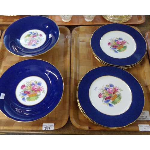 357 - Six Copeland Spode dinner plates with blue and gilt rims and central rose, lilac and tulip floral ba... 