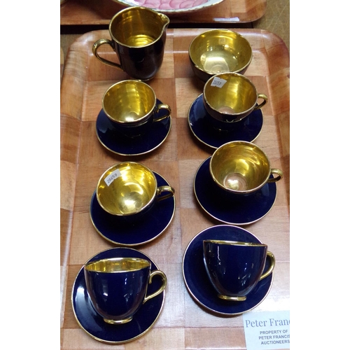 378 - Tray of dark blue and gilt coffee ware to include: coffee cups and saucers, milk jug and sucrier, ma... 