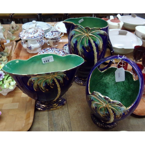 388 - Three Beswick ware English pottery palm tree design items: large jug, basket and centre bowl. (3)
(B... 