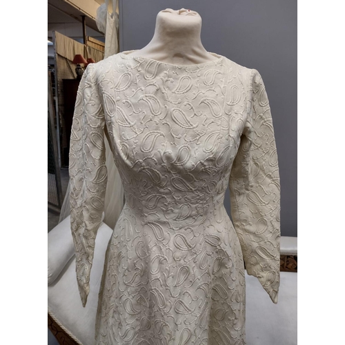 404 - Vintage (probably 1960's) paisley design brocade cream long sleeve wedding dress.
(B.P. 21% + VAT)