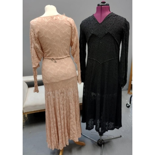 416 - Two vintage 1930's lace dresses; one in pale pink floral pattern lace with a cowl neck, long sleeves... 