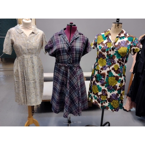 422 - Three vintage (20's-50's) patterned dresses; one a floral patterned crepe with sailor neckline and b... 