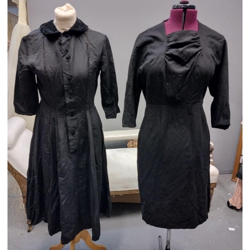 424 - Two black 1940's-60's vintage dresses; one with beaded detail in faille fabric with velvet collar an... 