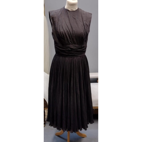 427 - Three 1950's/60's vintage dresses; one in faille fabric with a V neck and velvet piping, one 3/4 len... 