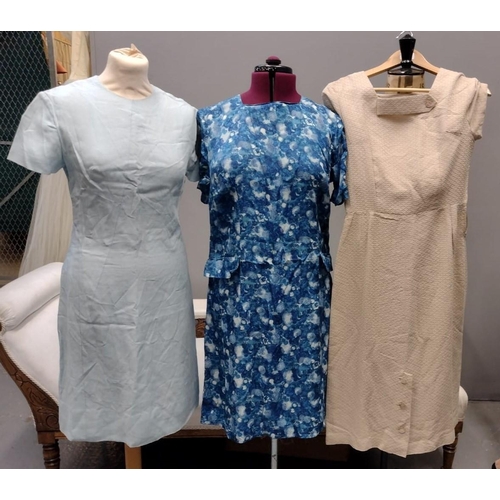 428 - Three vintage dresses (probably 60's) to include: a blue linen short sleeve shift dress, a beige bro... 