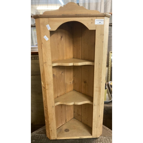 486 - Small pine hanging corner cabinet with shaped shelves.  (B.P. 21% + VAT)