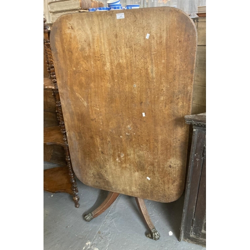 488 - 19th century mahogany tilt top breakfast table on quatrefoil base, brass paws and castors.   (B.P. 2... 